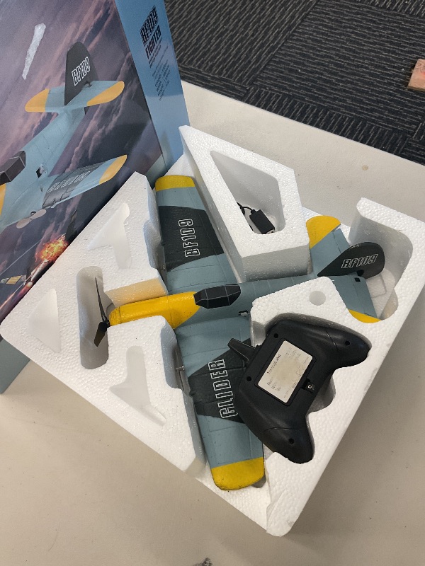 Photo 1 of Toileum RC Plane, 3 Channel Remote Control Airplane, 6-axis Gyro Stabilizer BF-109 RTF RC Airplane with 2 Batteries, Easy to Fly for Beginners Adults and Kids