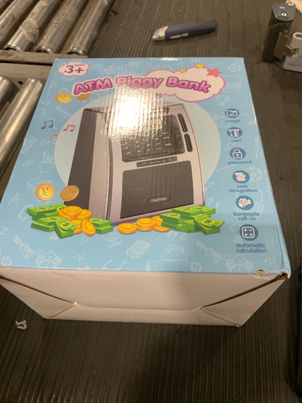 Photo 1 of Fishboy Talking ATM Piggy Bank for Kids with Dual Debit Cards, Power-Off Memory, Auto-Opening Drawer for Real Money for Boys, Onekey Shutdown, Bill Feeder, Coin Recognition, Balance Calculator Machine