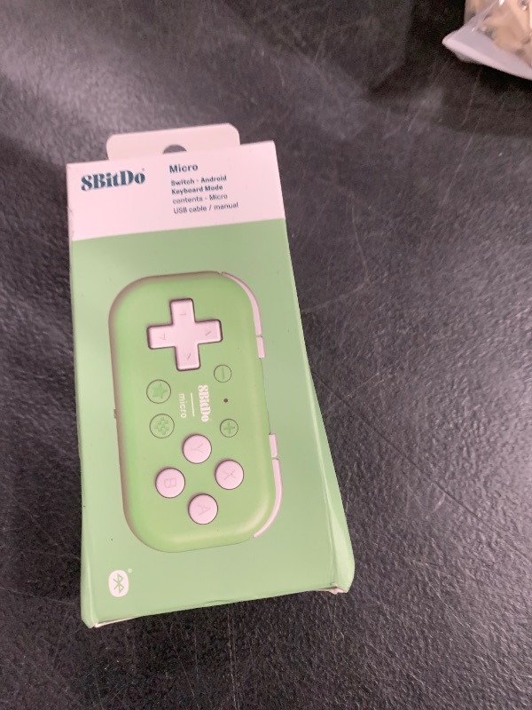 Photo 1 of 8Bitdo Micro Bluetooth Gamepad Pocket-sized Mini Controller for Switch, Android, and Raspberry Pi, Supports Keyboard Mode (Green)