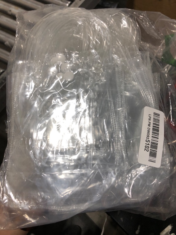 Photo 1 of LEIFIDE 50pcs Clear Plastic Gift Bags with Handles PVC Reusable Transparent Totes Bags for Goodie Candy School Birthday Party(5.1 x 5.9 x 2.7 Inch)