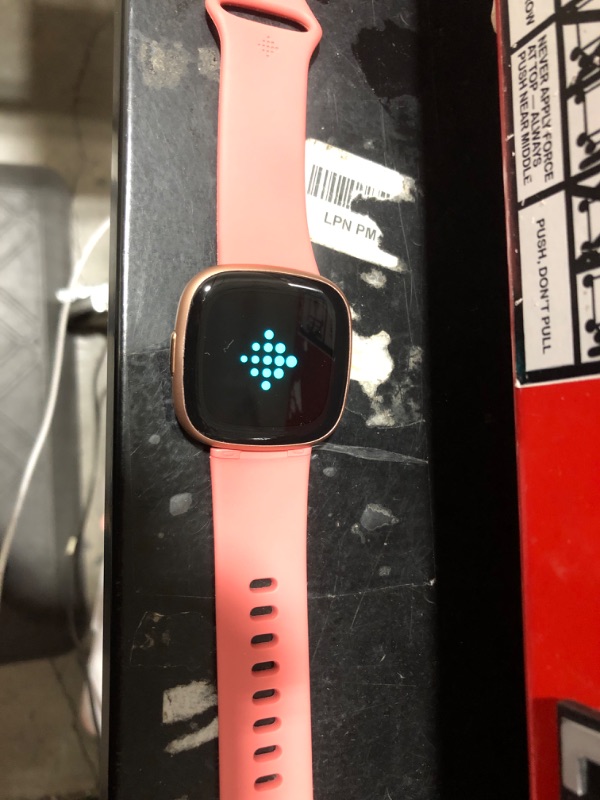 Photo 1 of Fitbit Versa 4 Fitness Smartwatch with Daily Readiness, GPS, 24/7 Heart Rate, 40+ Exercise Modes, Sleep Tracking and More, Pink Sand/Copper Rose, One Size (S & L Bands Included) (Renewed)