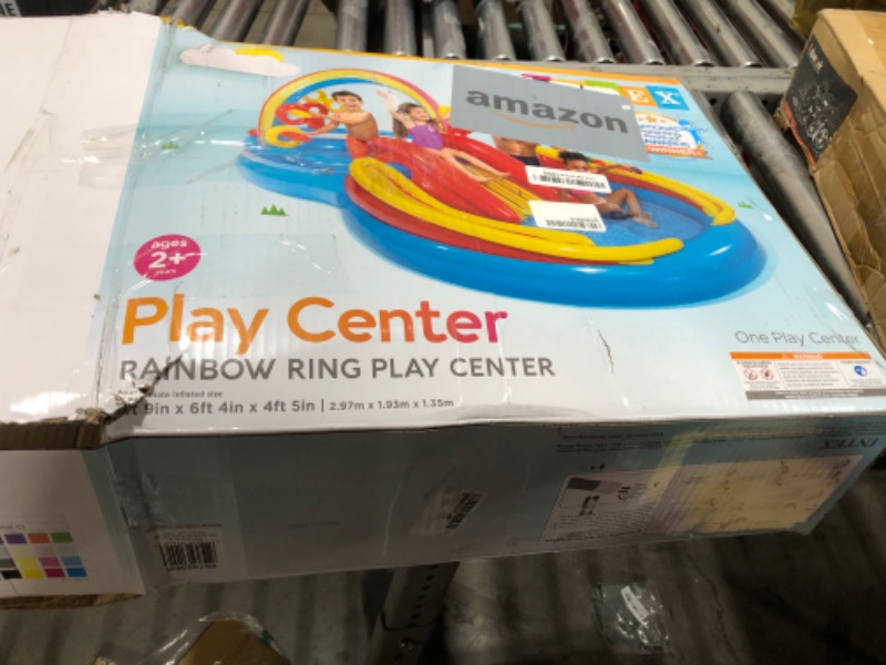 Photo 1 of Intex 57453EP 9.75 Foot x 6.3 Foot x 53 Inch Multicolor Rainbow Slide Kids Inflatable Pool with Water Slide and Ring Toss for Children Ages 2 and Up