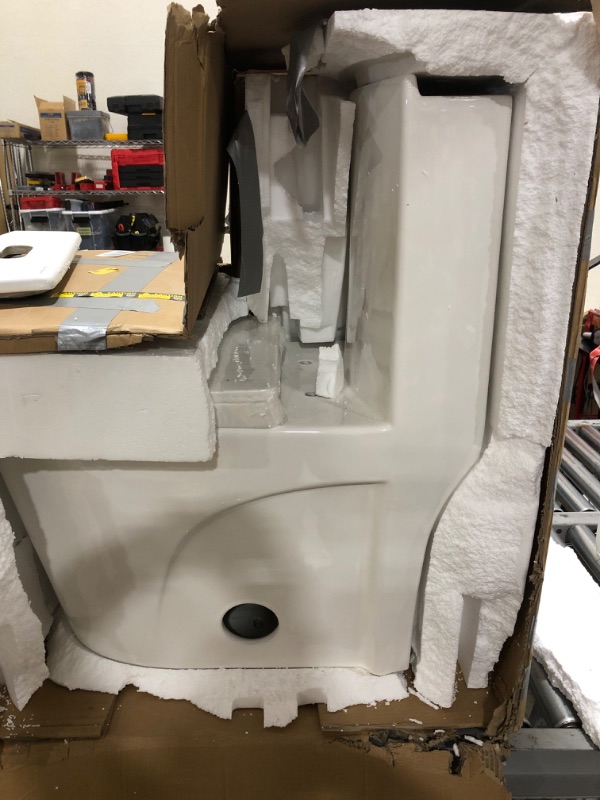 Photo 1 of Swiss Madison St. Tropez SM-1T254HB One-Piece Elongated Toilet Vortex Dual-Flush 1.1/1.6 gpf with Comfort Chair Seat ADA Height in Glossy White with Black Hardware