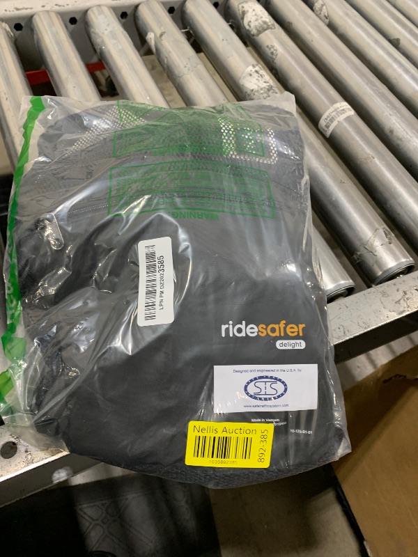 Photo 1 of RideSafer - Small Black, Lightweight, Compact, Portable Car Seat - Perfect for Travel and Everyday Child Safety