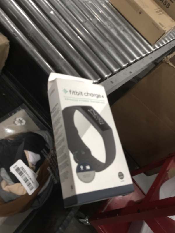 Photo 1 of Fitbit Charge 4 Black Advanced Fitness Tracker