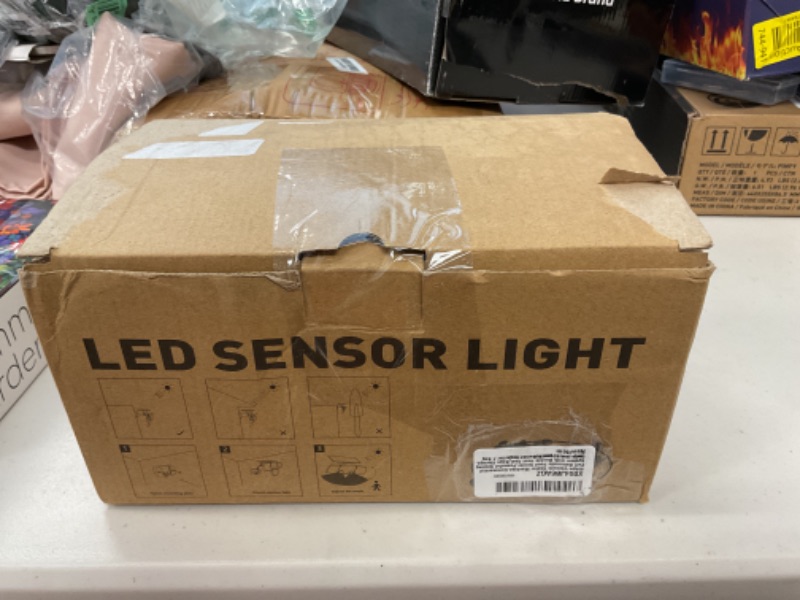 Photo 1 of LYWALT Solar Outdoor Lights - 3000LM 188 LED Motion Sensor Outdoor Lights, 4 Heads Security Light,IP65 Waterproof, Easy Install,270°Wide Angle Flood Wall Light with 3 Modes for Backyard Yard