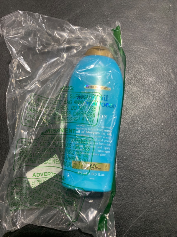 Photo 1 of OGX Radiant Glow + Argan Oil of Morocco Extra Hydrating Body Lotion for Dry Skin, Nourishing Creamy Body & Hand Cream for Silky Soft Skin, Paraben-Free, Sulfated-Surfactants Free, 19.5 Ounce