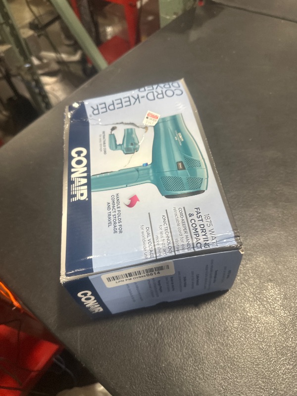 Photo 1 of Conair 1875 Watt Ionic Conditioning Cord Keeper Styler/Hair Dryer with Folding Handle, Blue