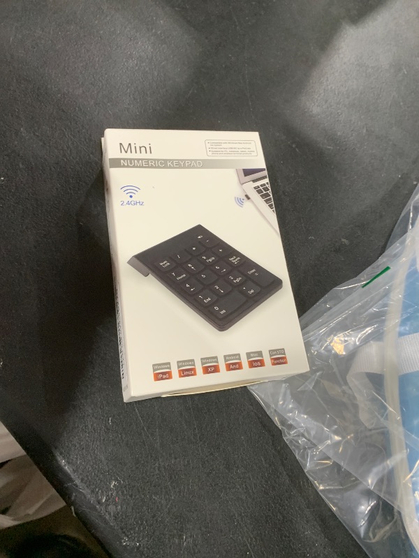 Photo 1 of DFCROMI USB Number Pad Wire18 Key Numeric Keypads Numpad Mini USB Receiver Portable Silent Financial Accounting Wireed Numeric Keyboard Extensions for Laptop, Desktop, Surface pro, Notebook, PC