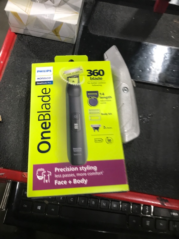 Photo 1 of Philips Norelco OneBlade Pro 360 Face + Body, Electric Shaver, Beard Trimmer and Body Groomer, with 360 Blade Technology, 14-Length Precision Comb, Body Kit, Soft Pouch, Model QP6542/70