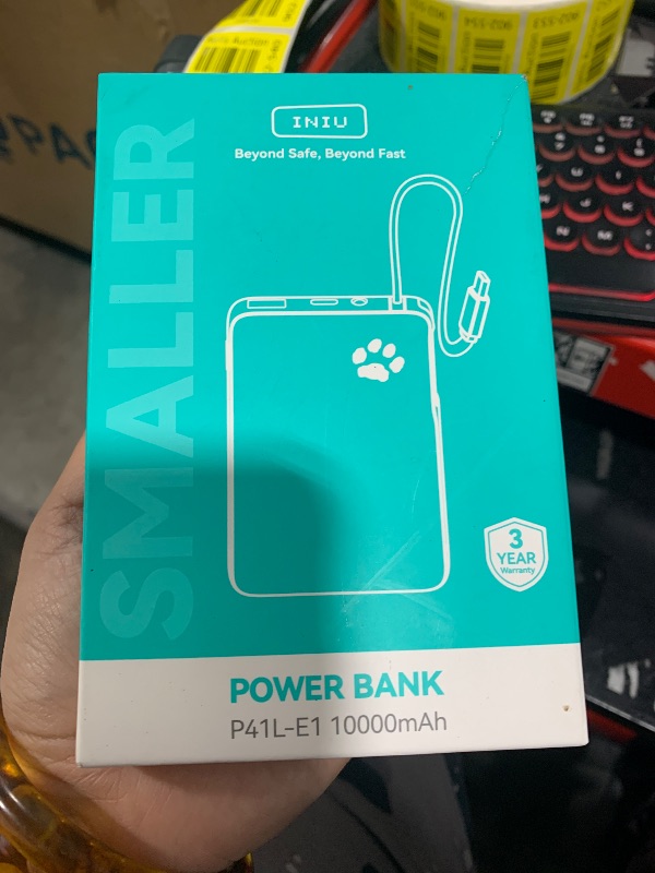 Photo 1 of INIU Portable Charger, Slim 10000mAh Power Bank with Build in USB-C Cable, 20W Fast Charging Mini Battery Pack, Travel Trip Flight Cruise Ship Essentials for College Students Travelers Boys Girls, Red