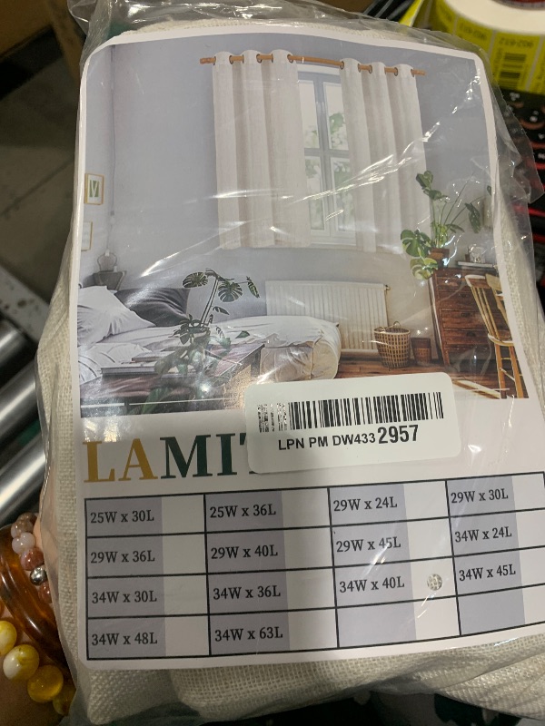 Photo 1 of LAMIT Linen Curtains 40 Inch Length 2 Panels, Cream Ivory Semi Sheer Light Filtering Panels Back Tab and Rod Pocket Neutral Drapes for Basement/Window/Loft Room, 34 x 40 Inch