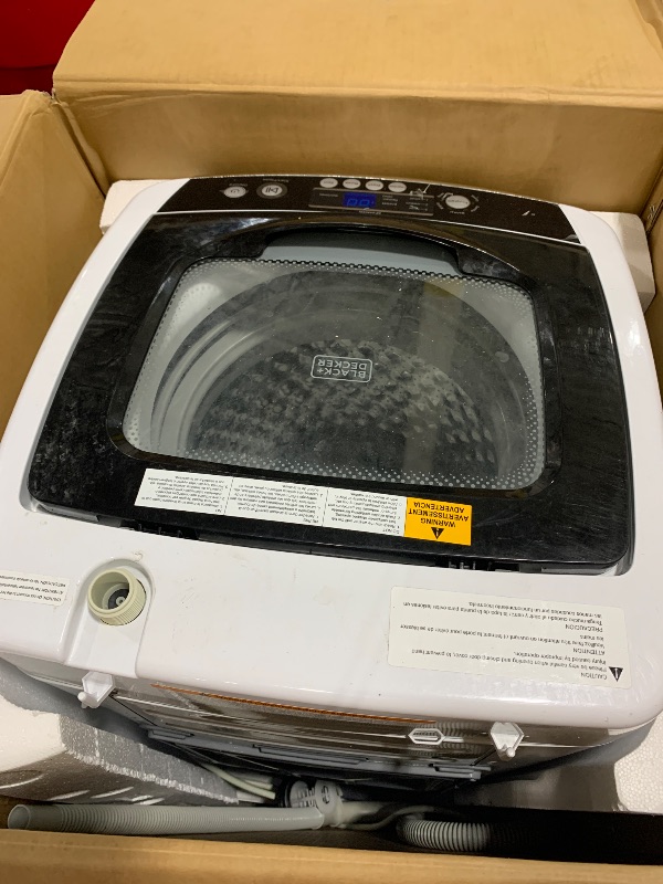 Photo 1 of BLACK+DECKER 0.9 Cu. Ft. Portable Washer, 6.6 lb. Capacity Washing Machine for Homes & Apartments, 5 Wash Cycles, Quick Connect Sink Adapter and Drain Hose Included, Transparent Lid, BPWM09W, White