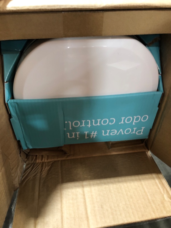 Photo 1 of Munchkin® STEP™ Diaper Pail Powered by Arm & Hammer, #1 in Odor Control, Award-Winning, Includes 1 Snap, Seal & Toss™ Bag, 1 Starter Refill Ring, and 1 PUCK™ Baking Soda Cartridge