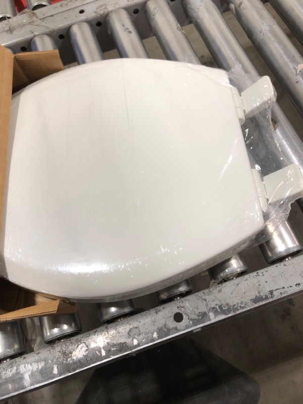 Photo 1 of Mayfair NextStep2 Toilet Seat with Built-In Potty Training Seat, Slow-Close, Easy Clean, Removable that will Never Loosen, Made in USA, ROUND, White