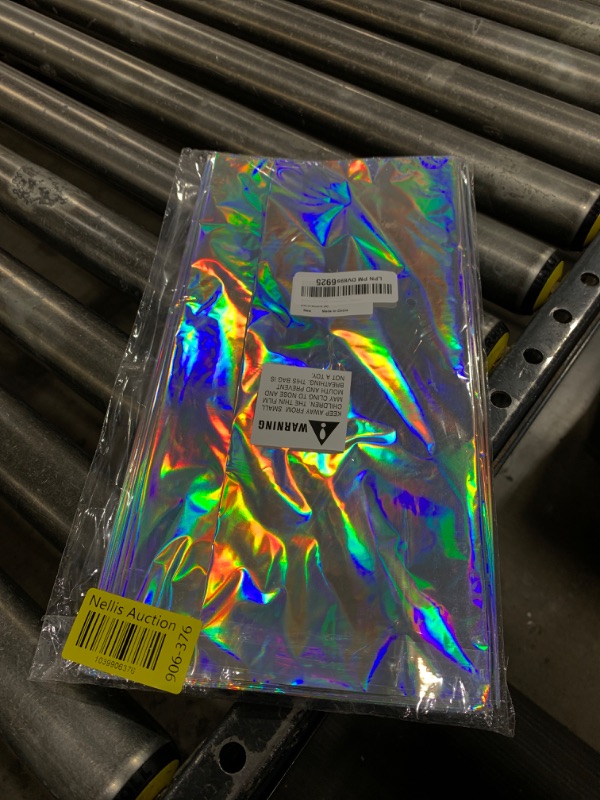 Photo 1 of MADLYN RHUE 6 Pack Iridescence Plastic Tablecloths Shiny Disposable Laser Table Covers 54" x 108" Sequin Holographic Foil Tablecloths for Birthday, Wedding, Party, Picnic, Buffet, Holiday Decorations