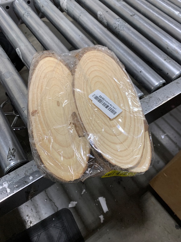 Photo 1 of 10 PCS Oval Wood Slices, Length 12 Inch and Width 3.9-4.7 Inch Craft Wooden Slices, Natural Unfinished Wood Slices for DIY Wedding