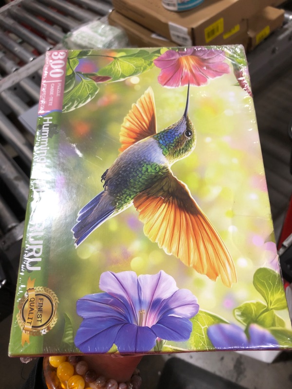 Photo 1 of 300 Pieces Puzzle for Adults,Hummingbird and Flowers Large Pieces Jigsaw Puzzle for Kids Adults Seniors,Recycled Paper,Glossy & Sturdy Pieces,Challenging Puzzle & Perfect Family Game (20.5 x 15 in)