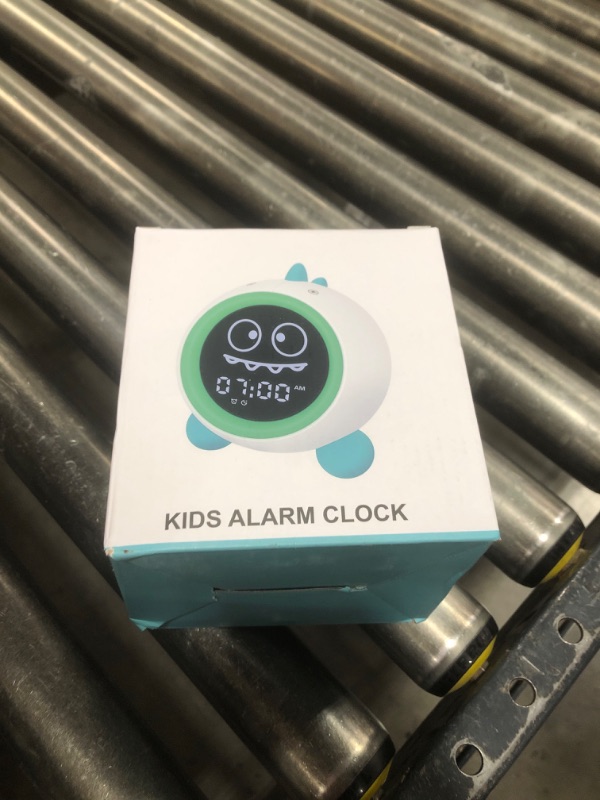 Photo 1 of Kids Alarm Clock, Toddler Sleep Training Clock with Night Lights, Sound Machine, Time to Wake Dinosaur Alarm Clock for Children, Gift Ideas for Kids Toddler Boy Girl (Green)