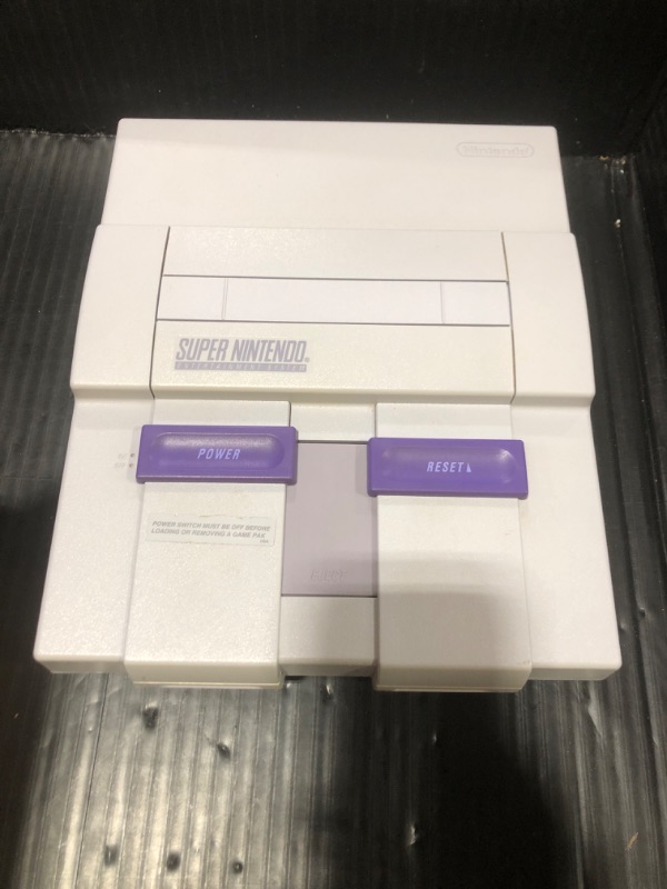 Photo 1 of Super Nintendo SNES Bundle with Super Mario World (Renewed)
