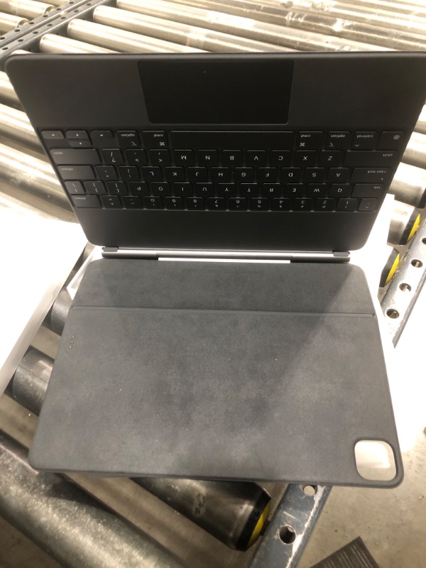 Photo 1 of Apple Magic Keyboard: iPad Keyboard and case for iPad Pro 12.9 inch (3rd, 4th, 5th and 6th gen) and iPad Air (M2), Great Typing Experience, Built-in trackpad, US English - Black