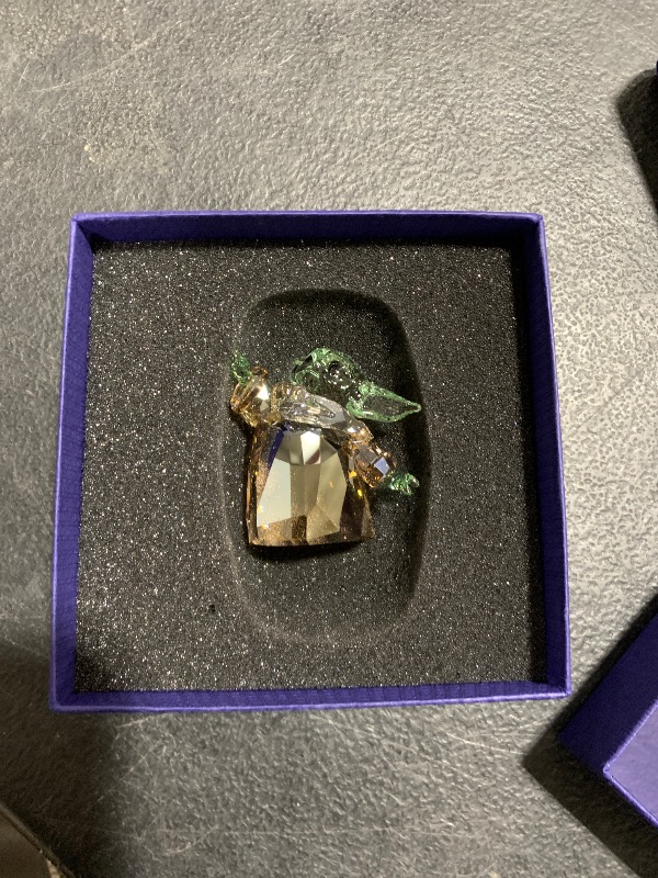 Photo 1 of Swarovski Star Wars The Mandalorian, The Child Crystal Figurine, Teal and Brown Crystals