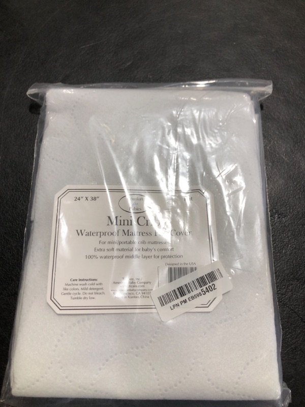 Photo 1 of American Baby Company 2 Pack Waterproof Embossed Quilt-Like Flat Reusable Portable/Mini-Crib Size Protective Mattress Pad Cover for Babies, Adults and Pets, White 24" X 38"