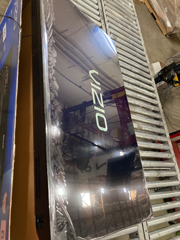 Photo 1 of **SCREEN IS DAMAGED IN TOP RIGHT CORNER FINAL SALE**VIZIO V4K65M 65 inch Class 4K UHD HDR Smart TV
