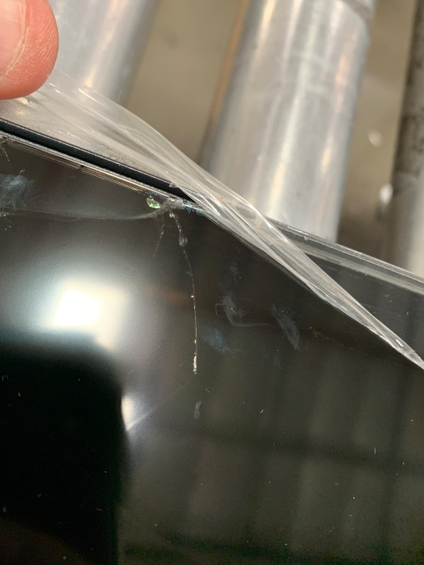 Photo 1 of CRACKED/BROKEN SCREEN**TCL 55-Inch Q65 QLED 4K UHD Smart TV with Google TV (55Q651G, 2024 Model) Dolby Vision, Dolby Atmos, HDR Pro+, Game Accelerator Enhanced Gaming, Voice Remote, Works with Alexa, Streaming Television