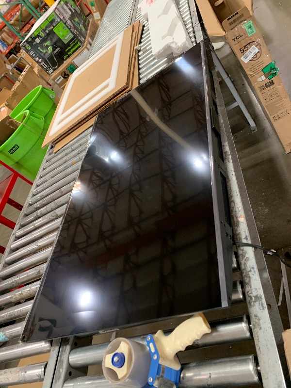 Photo 1 of CRACKED/BROKEN SCREEN**TCL 55-Inch Q65 QLED 4K UHD Smart TV with Google TV (55Q651G, 2024 Model) Dolby Vision, Dolby Atmos, HDR Pro+, Game Accelerator Enhanced Gaming, Voice Remote, Works with Alexa, Streaming Television