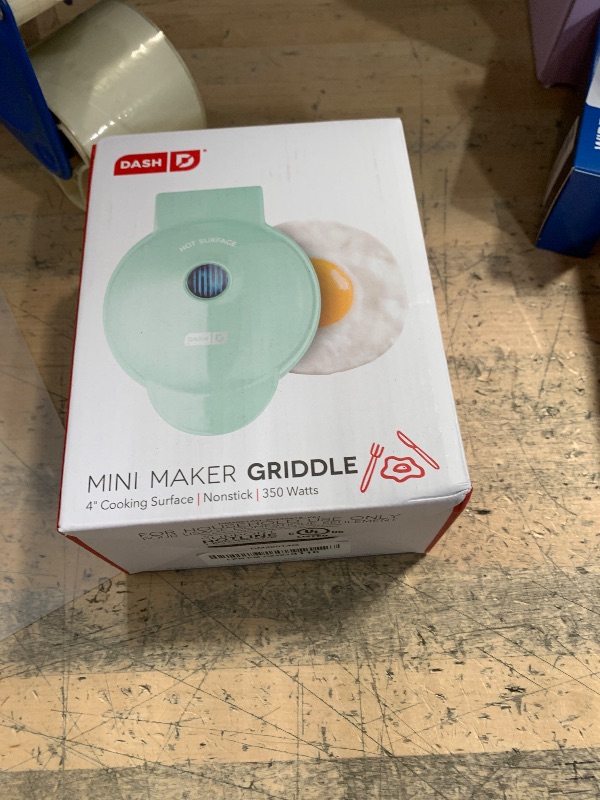 Photo 1 of DASH Mini Maker Electric Round Griddle for Individual Pancakes, Cookies, Eggs & other on the go Breakfast, Lunch & Snacks with Indicator Light + Included Recipe Book - Aqua,4 Inch