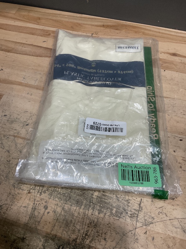 Photo 1 of *Premium* Ivory Table cover 54" x 108"