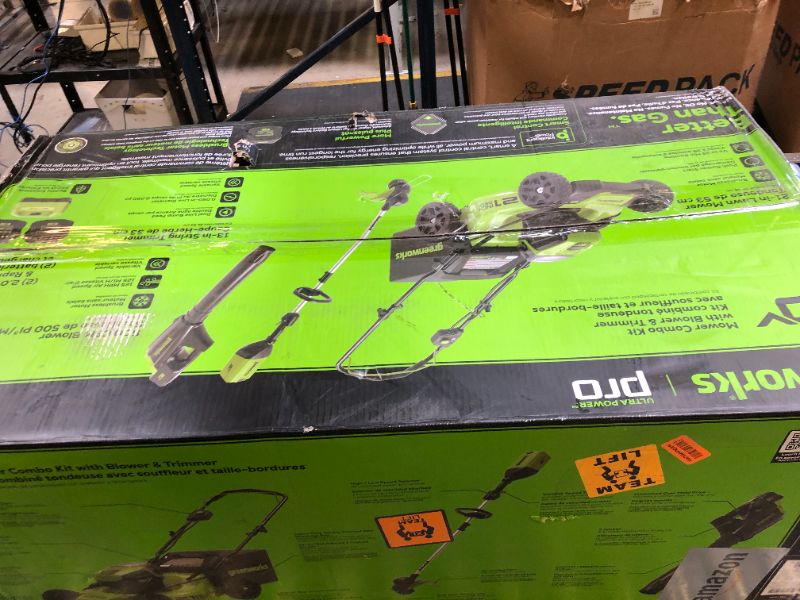 Photo 1 of Greenworks 80V 21” Brushless (Push) Cordless Electric Lawn Mower + (500 CFM) Axial Leaf Blower + 13” String Trimmer (75+ Compatible Tools), (2) 2.0Ah Batteries and 30 Minute Rapid Charger