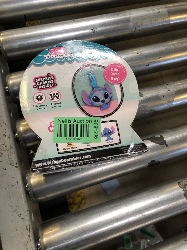 Photo 1 of DOORABLES Disney Tag-A-Longs Stitch Wearable Figure and Charms Series 1, Collectible Figure, Styles May Vary, Kids Toys for Ages 3 Up by Just Play