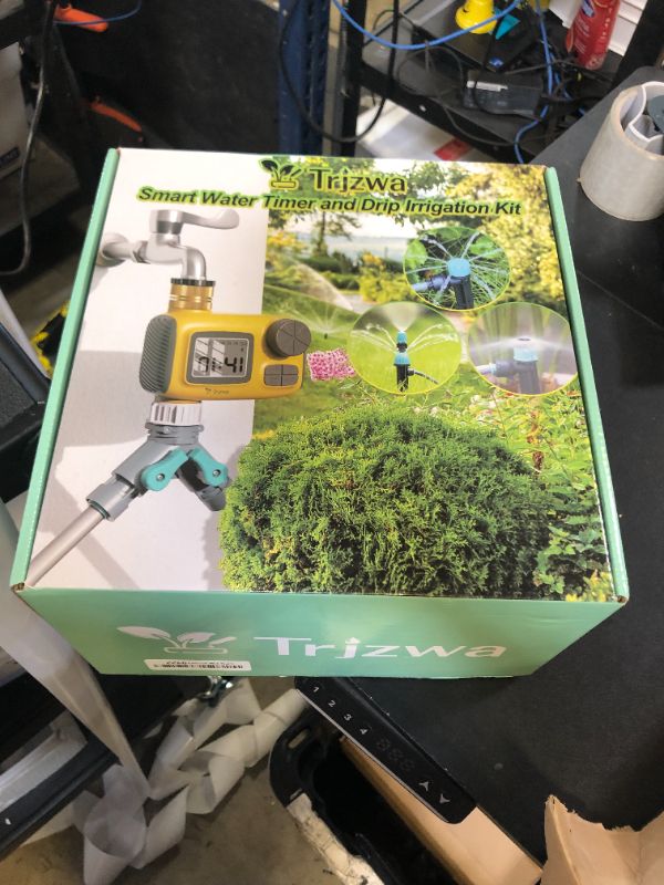 Photo 1 of TRJZWA Drip Irrigation System Kit with Water Timer 100FT?1/2 inch Hose 1/4 inch Distribution Tubing?Water Timer for Garden Hose with Anti-Leakage Quick Connector and Drip Emitters,for Potted Plant