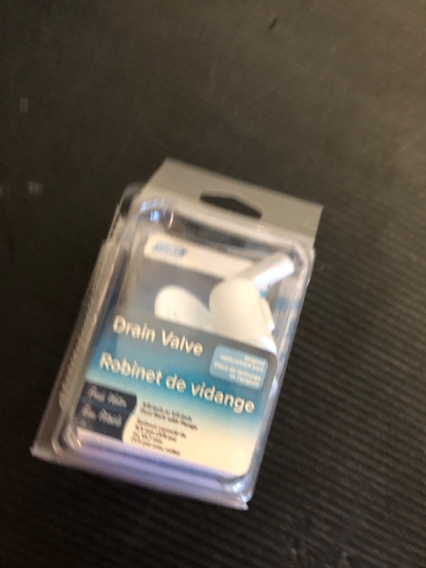 Photo 1 of Camco 22223 Drain Valve - 3/8" or 1/2" Dual Barb with Flange, White