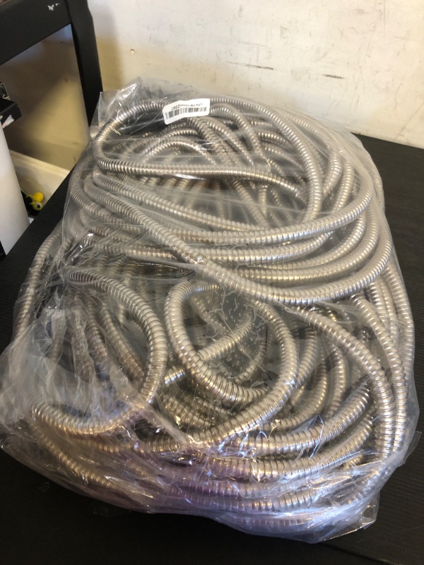 Photo 1 of SPECILITE 150ft 304 Stainless Steel Garden Hose Metal, Heavy Duty Water Pipe with Nozzles for Yard, Outdoor - Flexible, Never Kink & Tangle, Puncture Resistant (Sliver)