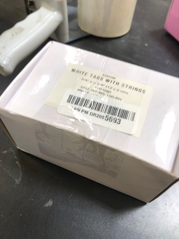 Photo 1 of White Shipping Tags with String - 4 3/4" x 2 3/8" - Box of 100 Hang Tags with String Attached and Reinforced Hole, Paper Blank Tags, Large Tags with String for Any Occasion