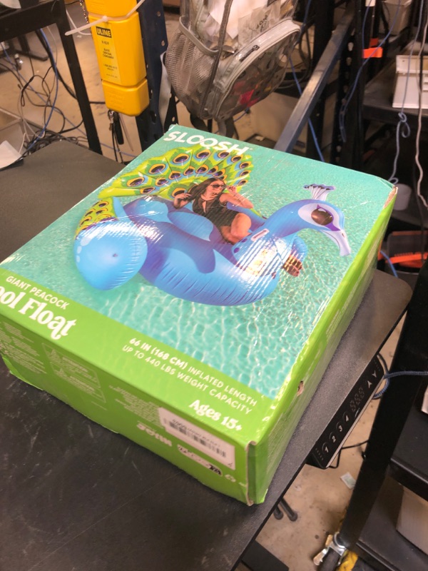 Photo 1 of JOYIN Inflatable Peacock Pool Float - Giant Blue Peacock Fun Beach Floaties, Swim Party Animal Decorations Adult Size Inflatable Summer Pool Raft Toys Lounge for Adults & Kids