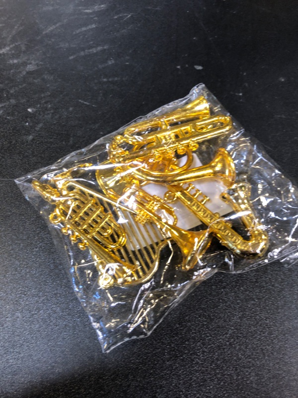 Photo 1 of Mini Musical Instruments Set Miniature Musical Instruments Gold Christmas Tree Ornaments Mini Instruments Collection with Tiny Guitar Trumpet Saxophone Dollhouse Accessories Holiday Decorations 7pcs