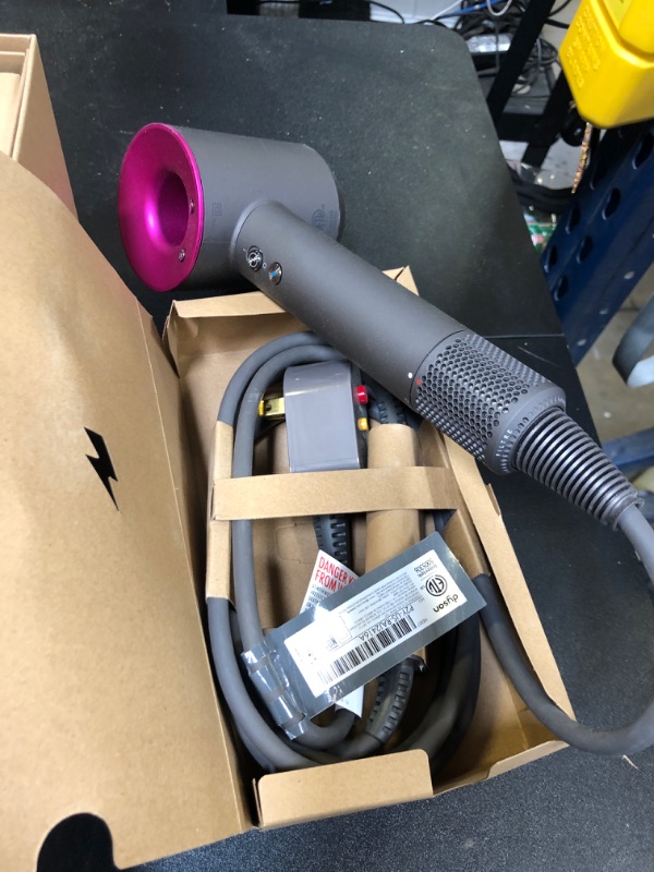 Photo 1 of Dyson Supersonic™ Hair Dryer, Iron/Fuchsia