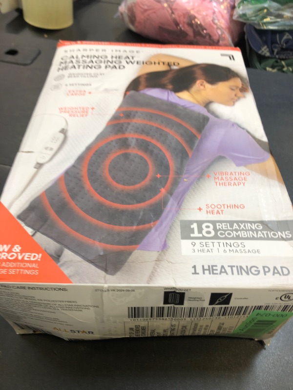 Photo 1 of Calming Heat Massaging Weighted Heating Pad by Sharper Image- Weighted Electric Heating Pad with Massaging Vibrations, 9 Settings- 3 Heat, 6 Massage- 18 Relaxing Combinations, 12” x 24”, 4 lbs