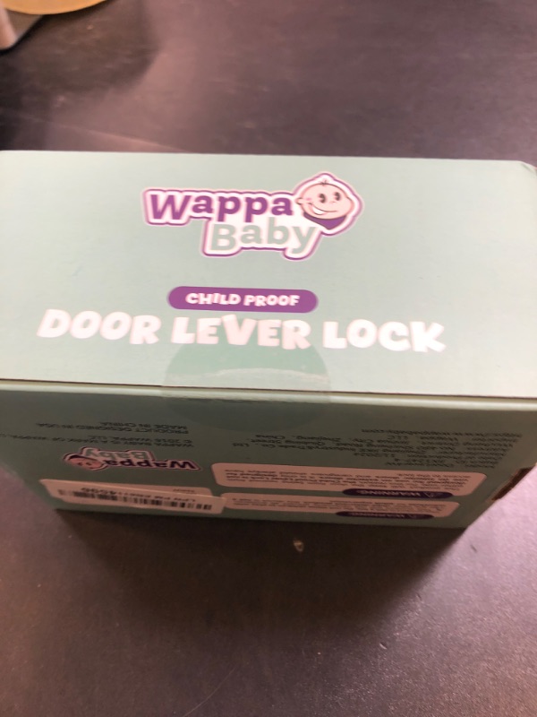 Photo 1 of Door Lever Locks (4 Pack) - Prevents Toddlers from Opening Doors - Durable ABS with 3M Adhesive - Easy One-Hand Operation for Adults, No Tools Needed