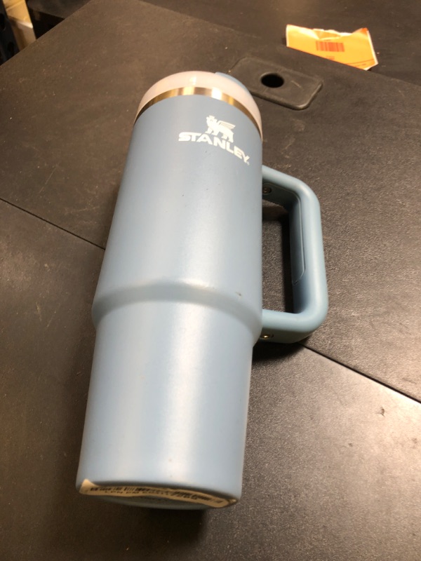 Photo 1 of Stanley Quencher H2.0 Tumbler with Handle and Straw 30 oz | Flowstate 3-Position Lid | Cup Holder Compatible for Travel | Insulated Stainless Steel Cup | BPA-Free | Indigo