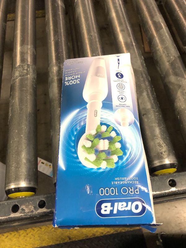 Photo 1 of Oral-B Pro 1000 Rechargeable Electric Toothbrush, White