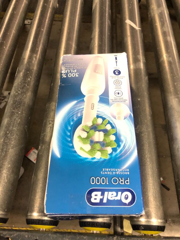 Photo 1 of Oral-B Pro 1000 Rechargeable Electric Toothbrush, White