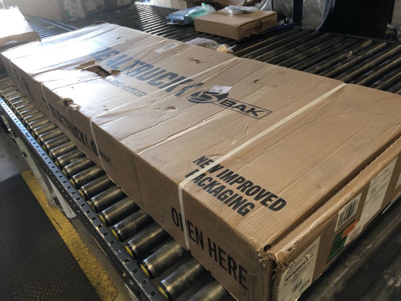 Photo 1 of RealTruck BAK BAKFlip MX4 Hard Folding Truck Bed Tonneau Cover | 448130 | Fits 2019-2025 Chevy/GMC Silverado/Sierra, w/MultiPro/Flex Tailgate (Will not fit Carbon Pro Bed) 5' 10" Bed (69.9")
