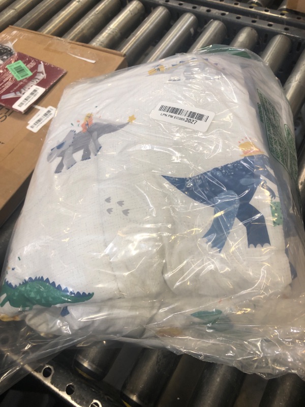 Photo 1 of DJY Cotton Toddler Bedding Set, Blue Dinosaur Toddler Comforter Set for Boys Girls, 4 Pieces Soft Toddler Bed Set Includes Quilted Comforter, Flat Sheet, Fitted Sheet and Pillowcase