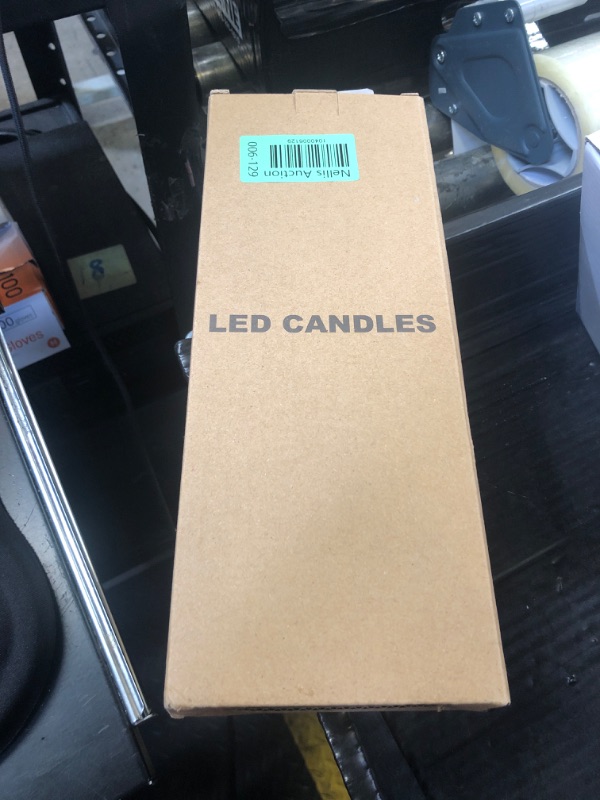 Photo 1 of GenSwin Flameless Taper Candles with Remote Timer, Real Wax LED Flickering Candlesticks Battery Operated 3D Wick for Wedding, Party, Home(Ivory, 9.84", Set of 3)