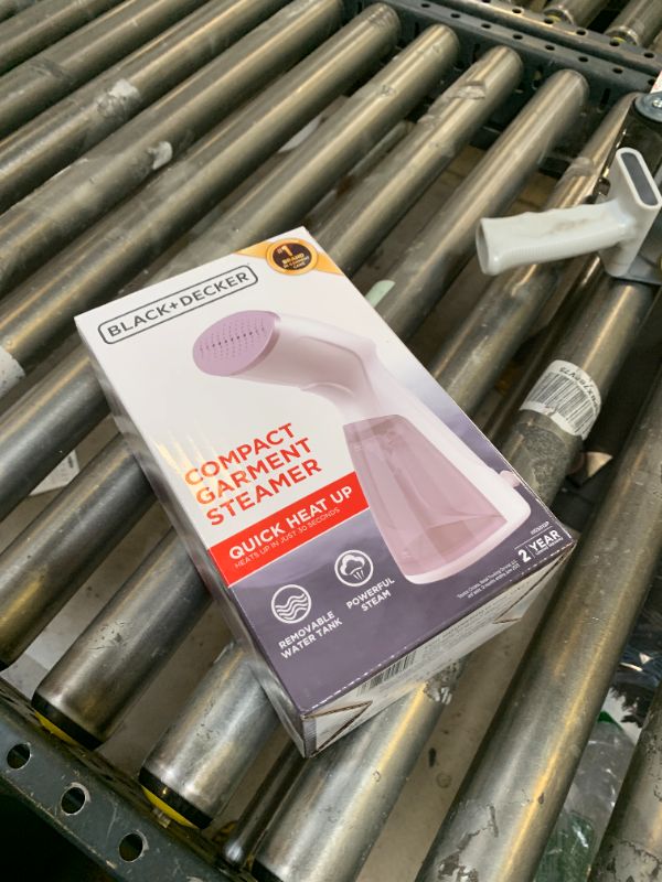 Photo 1 of BLACK+DECKER Compact Handheld Steamer, HGS012P, 25-Second Heat Up, 1000 Watts, Removes Wrinkles from Fabrics, Clothing and Upholstery
